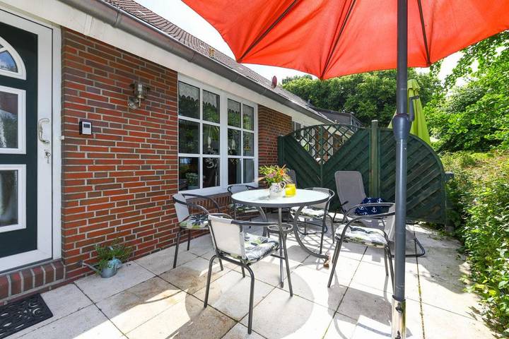 Ferienwohnung für 3 Personen, mit Terrasse und Garten sowie Ausblick in Werdum