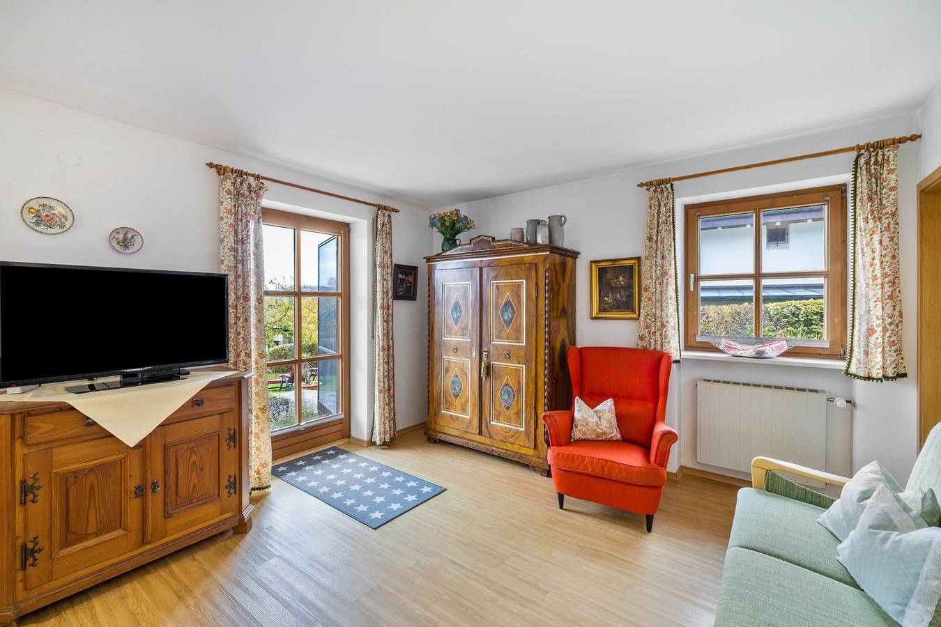 Apartamento entero, Apartamento 'Kauderer - Wohnung 1' con terraza privada, jardín compartido y Wi-Fi in Waging am See, Rupertiwinkel
