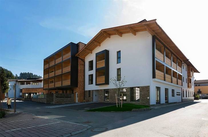 Ferienwohnung für 4 Personen, mit Balkon und Terrasse sowie Pool und Sauna in Kössen