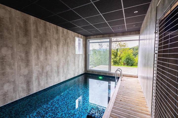Appartement de vacances pour 4 personnes, avec sauna et jardin ainsi que jacuzzi et piscine