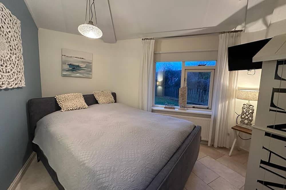Ferienhaus Kamin,  ruhig gelegen, Hund willkommen, Garten kompl. eingezäunt in Julianadorp aan Zee, Julianadorp
