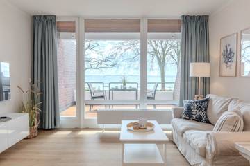 Ferienwohnung für 2 Personen, mit Seeblick und Sauna sowie Ausblick und Balkon in Schashagen