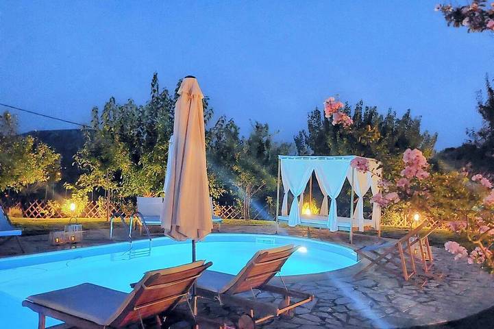 Ferienhaus für 8 Personen, mit Balkon und Garten in Asini
