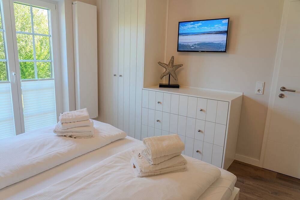 Ganze Wohnung, Moderne Ferienwohnung in List für zwei Personen mit Terrasse und Strandnähe in List (Sylt), Sylt