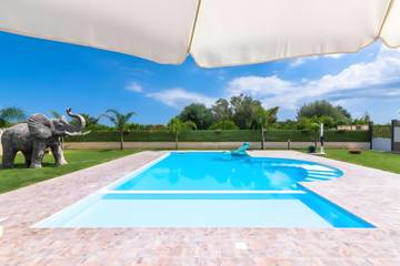 Location de vacances pour 8 personnes, avec bassin pour enfant et jardin à Avola