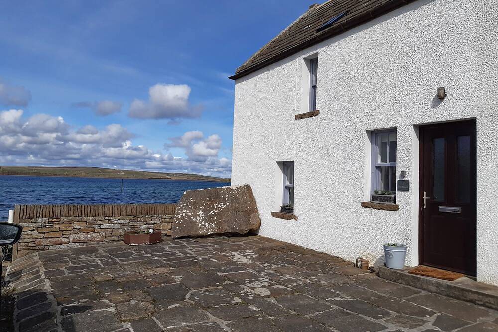 Einzigartiges Ferienhaus am Meer in einem malerischen Dorf. in Orkney Inseln