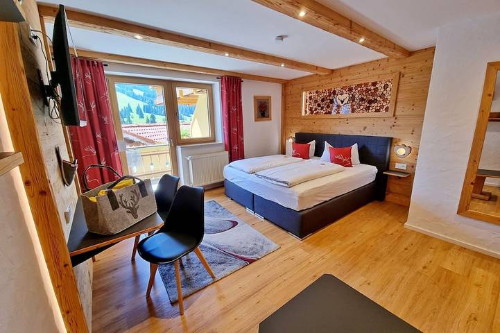 Ferienwohnung für 10 Personen, mit Balkon und Sauna sowie Whirlpool und Garten in Jungholz