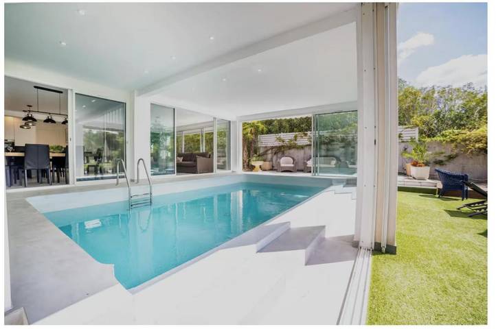 Villa pour 8 personnes, avec Terrasse et Jardin ainsi que Piscine et Vue sur le lac à La Grande-Motte
