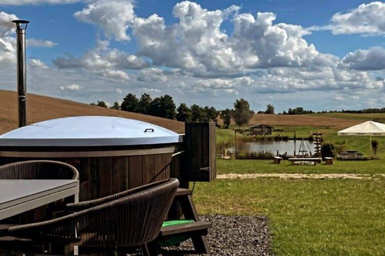 Holiday home, bedroom with bathtub, jacuzzi in Tuchola Forest