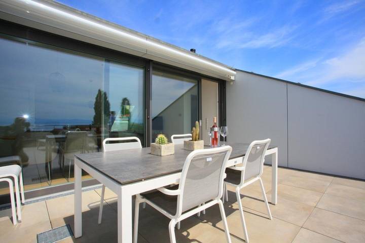 Ferienwohnung für 4 Personen, mit Terrasse und Garten sowie Seeblick in Immenstaad