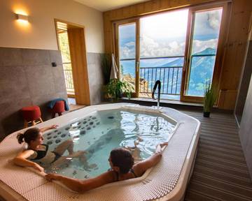 Hôtel pour 4 personnes, avec jardin et jacuzzi ainsi que sauna et terrasse à Champéry
