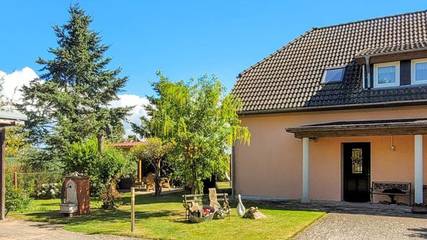 Ferienwohnung für 2 Personen, mit Terrasse und Garten sowie Seeblick in Lüssow