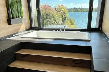 Ferienhaus für 8 Personen, mit Balkon und Whirlpool sowie Garten und Sauna in Löbnitz