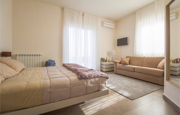 Apartamento con vistas al mar, aire acondicionado, piscina y terraza in Viagrande, Etna