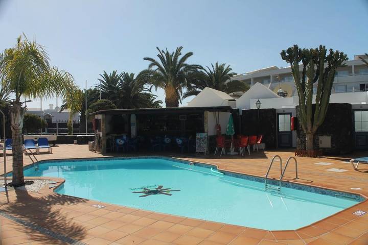 Apartahotel para 3 personas, con Terraza además de Jardín y Piscina en Puerto del Carmen