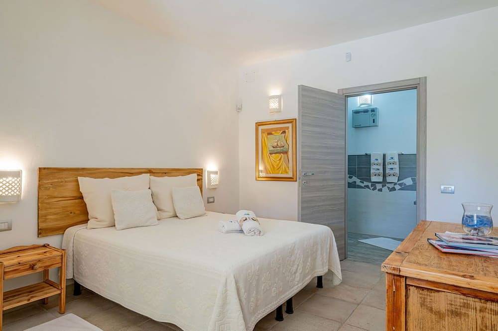 Wohnung in einem Ferienhaus mit Pool, Klimaanlage,  W-Lan, Tv, Innenhof, Haustiere erlaubt in Eden Beach, Sorso