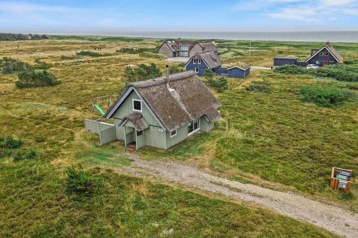 Ferienhaus mit Meerblick für 6 Personen, mit Balkon und Balkon/Terrasse sowie Terrasse und Sauna in Blavand