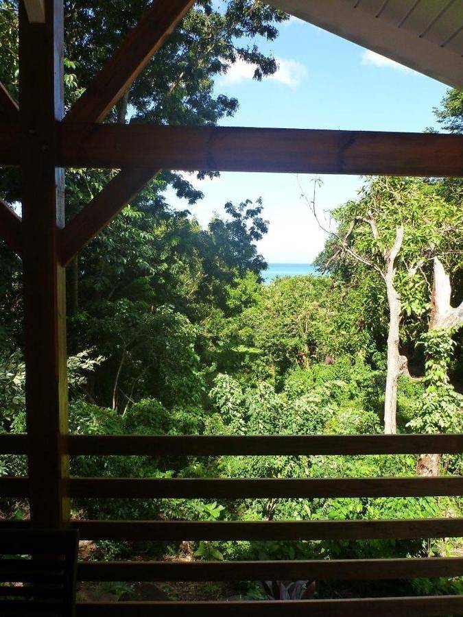 Gîte pour 2 personnes, avec vue et jardin, adapté aux familles dans Plage de la Perle - 2