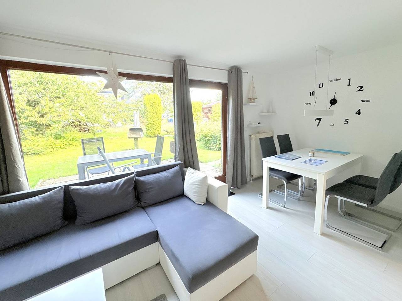 Bungalow im Garten - ruhig im Grünen mit Grill - Bungalow im Garten - Komfortables Ferienhaus mit Terrasse und Feuerschale in Wiek, Rügen
