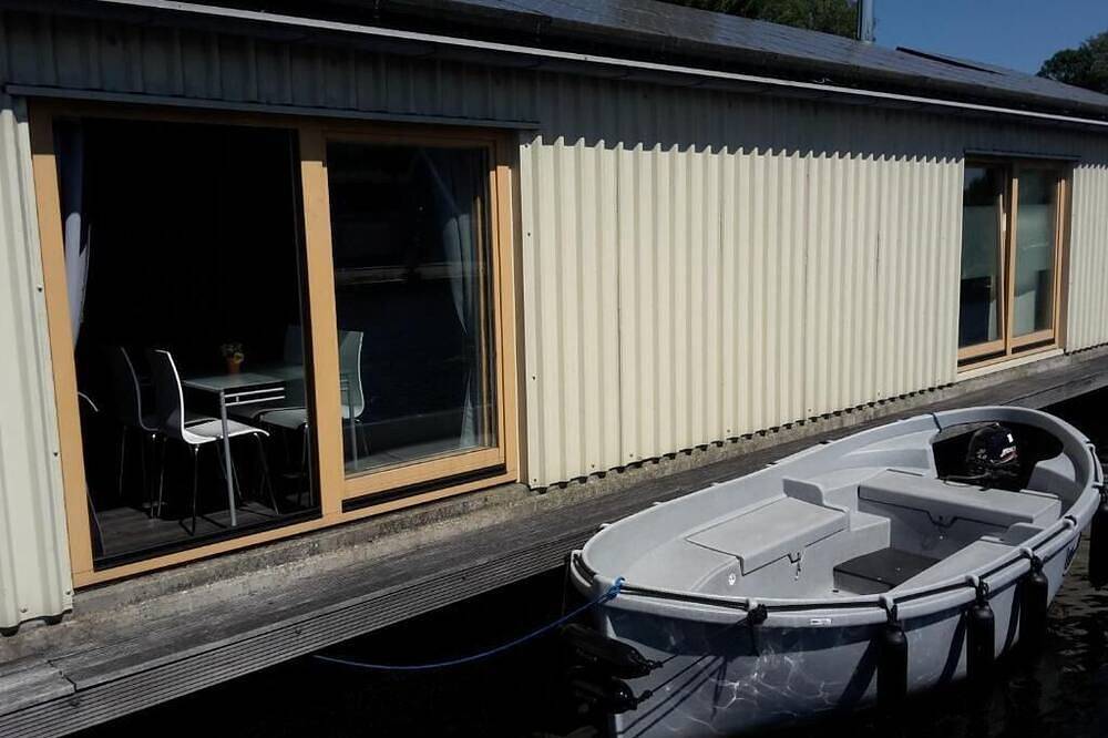 Boathouse Amsterdam with bikes in Amsterdam Nieuw-West, Nordholland