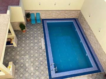 Cottage pour 8 personnes, avec vue ainsi que piscine et balcon dans Selouane