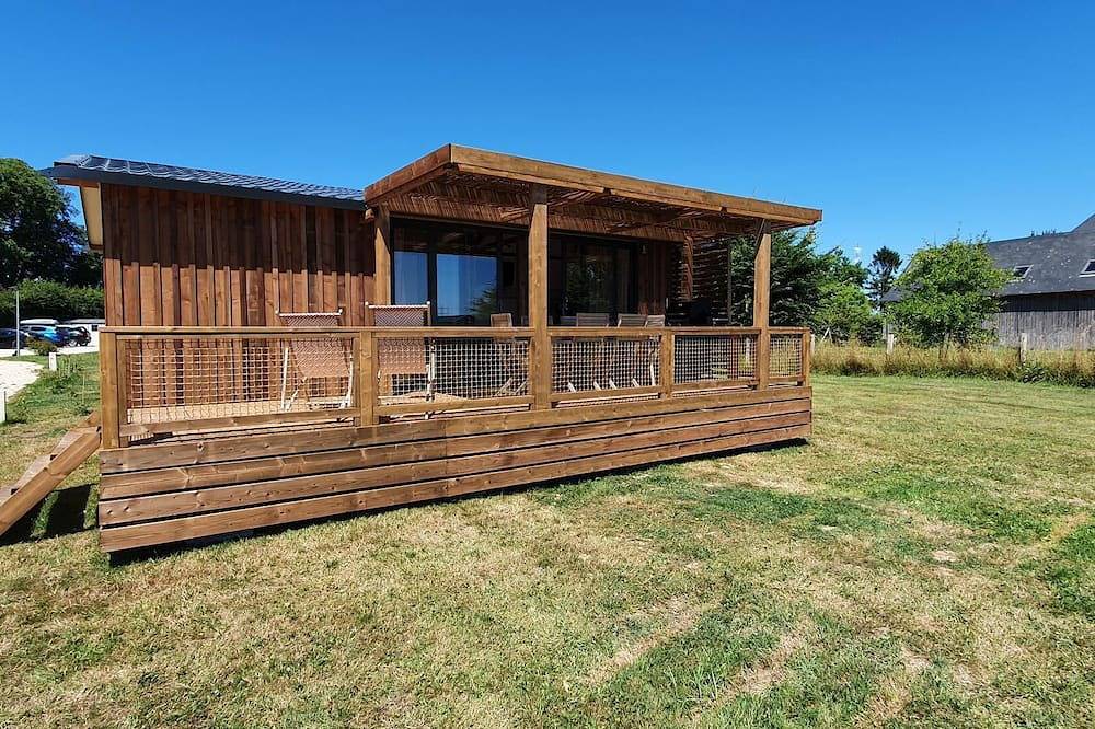 Chalet domaine Normandie, piscine chauffée. in Sainte-Opportune-la-Mare, Région de Bernay