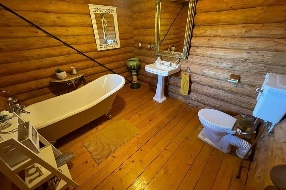 Woodpecker two storey log cabin with a pizza oven,bbq,hot tub, pool table, fishing peg@tattershall in Tattershall, Lincolnshire