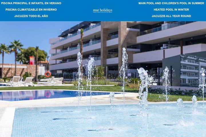 Apartamento para 6 personas, con jacuzzi y piscina para niños además de piscina y jardín, Se admiten mascotas en Playa Flamenca