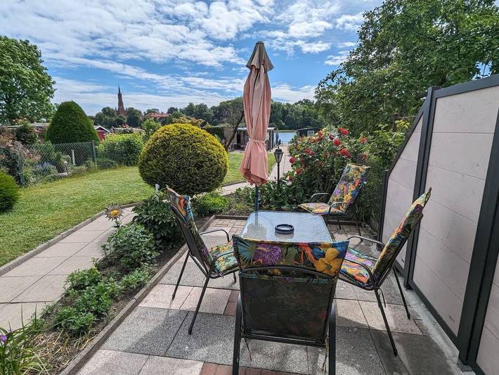 Ferienwohnung für 2 Personen, mit Terrasse und Garten sowie Seeblick in Malchow