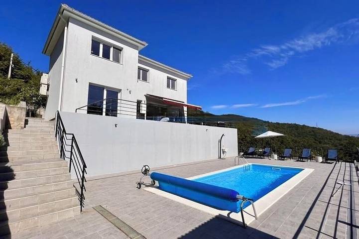 Ferienhaus für 10 Personen, mit Balkon und Garten