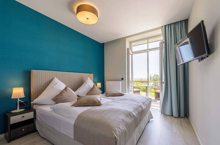 Ferienwohnung für 3 Personen, mit Terrasse und Sauna sowie Seeblick in Wustrow