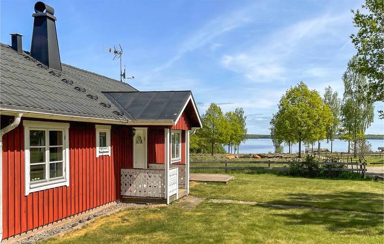 Ferienhaus für 4 Personen, mit Terrasse und Garten sowie Seeblick