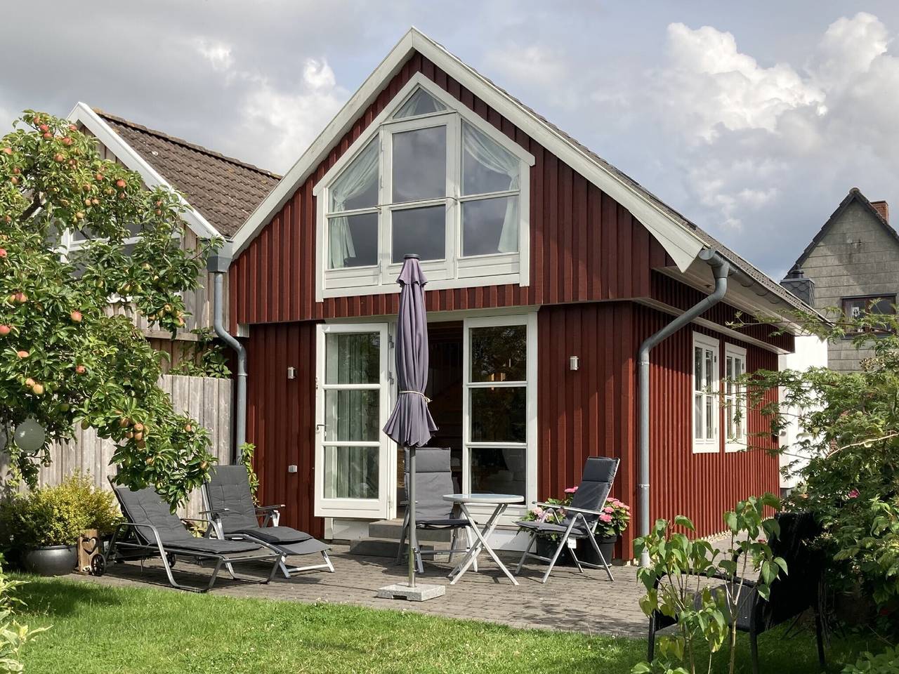 Vakantiehuis 'Bullerbü Ferienhäuschen Arnis' met privéterras en eigen tuin, foto 14