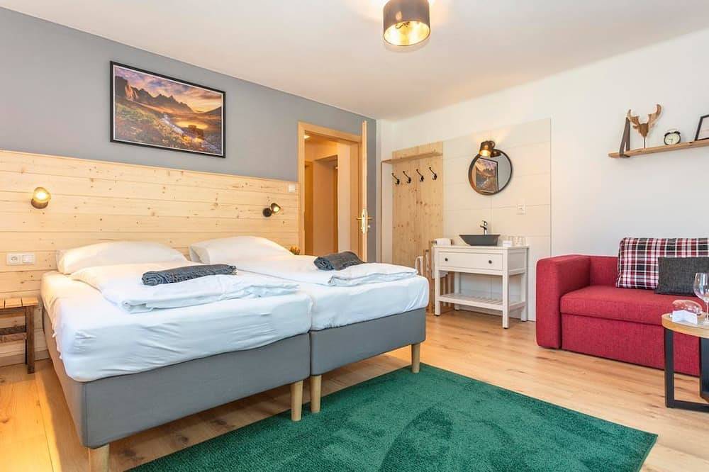 Familiensuite, 2 Schlafräume Badezimmer - Sonnberg Lodge in Maria Alm, Pinzgau