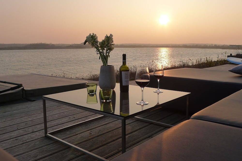 Privatstrand! Haus 'California' mit Kamin, Sauna & Whirlpool direkt am See in Löbnitz, Nordsachsen