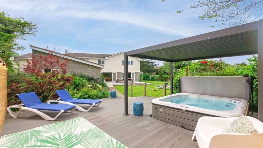 Maison de vacances pour 12 personnes, avec jacuzzi et jardin, adapté aux familles à Croyde