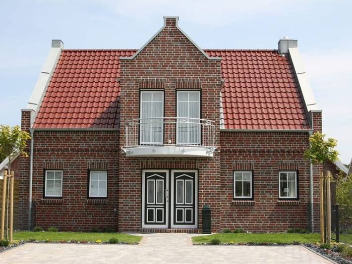 Ferienhaus für 6 Personen, mit Balkon und Whirlpool sowie Terrasse und Garten