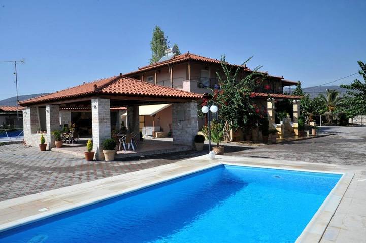 Appartement de vacances pour 5 personnes, avec jardin ainsi que vue et piscine, adapté aux familles