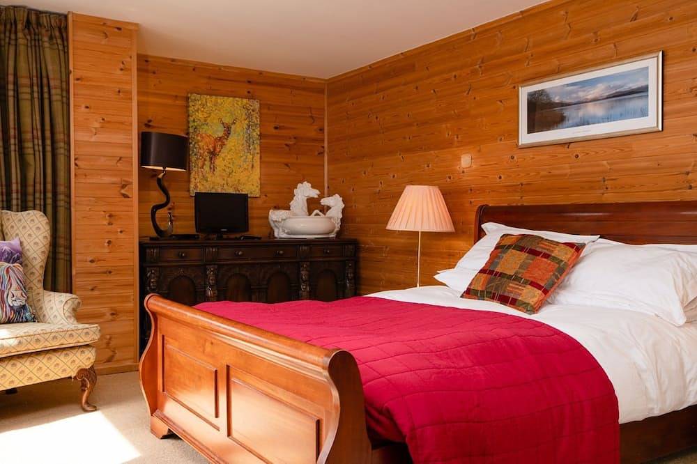Pine Ridge Lodge -  a lodge that sleeps 8 guests  in 4 bedrooms in Boat of Garten, Highlands