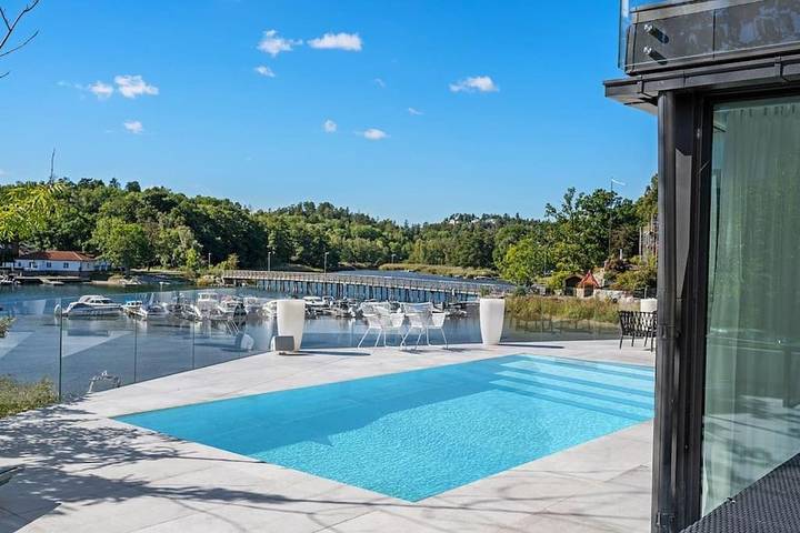 Villa für 11 Personen, mit Seeblick und Pool sowie Garten und Ausblick in Schweden - 4