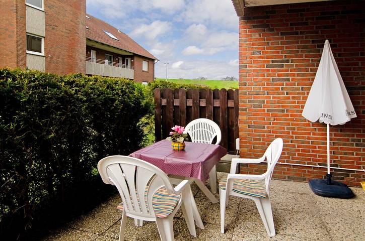 Apartamento inteiro, Apartamento 47 Haus Seestern com terraço privado e Wi-Fi in Strand Norddeich, Norddeich