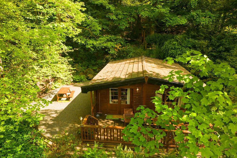 Luxury pine log cabin positioned within the mountains of the Lake District in Skelwith Bridge, Lake District