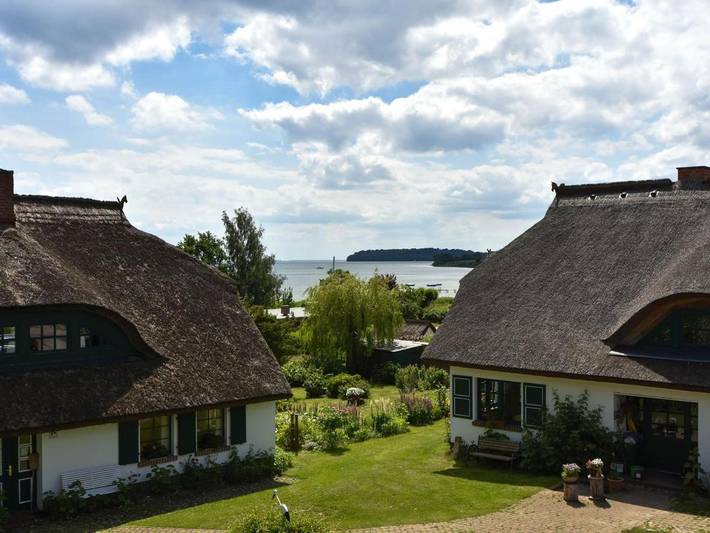 Ferienwohnung für 4 Personen, mit Terrasse und Garten sowie Ausblick und Seeblick
