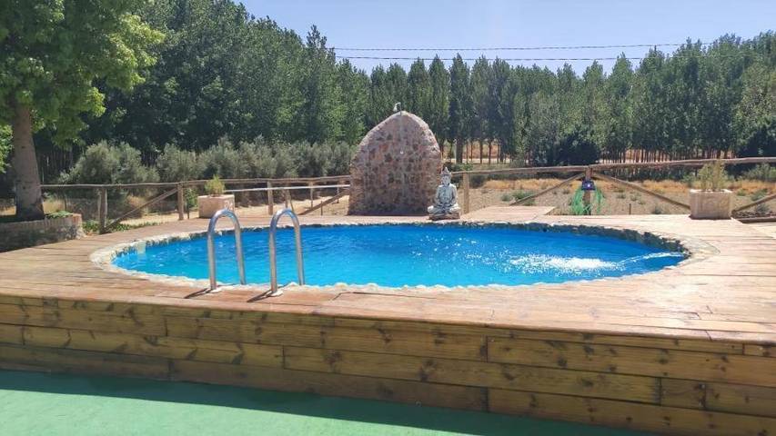 Location de vacances pour 5 personnes, avec piscine ainsi que jardin et vue, adapté aux familles à Guadix