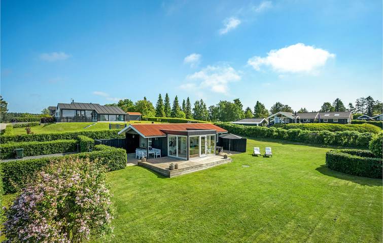 Ferienhaus für 4 Personen, mit Terrasse und Garten