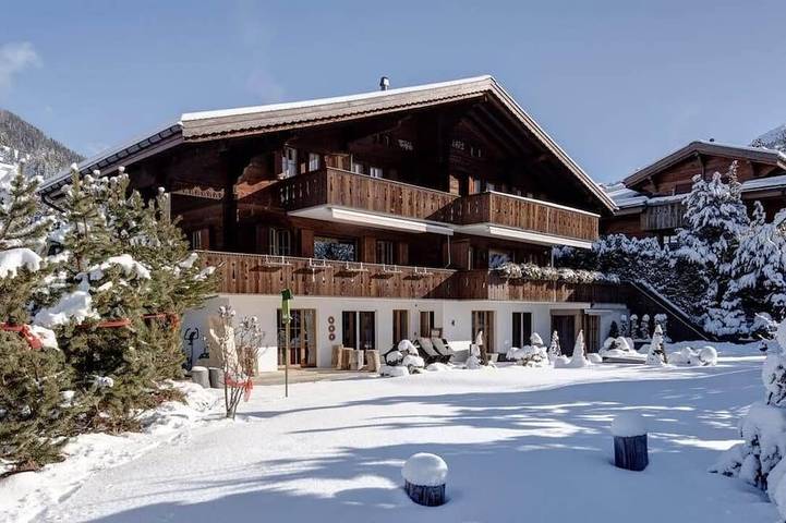 Chalet pour 14 personnes, avec jardin et balcon dans Gstaad