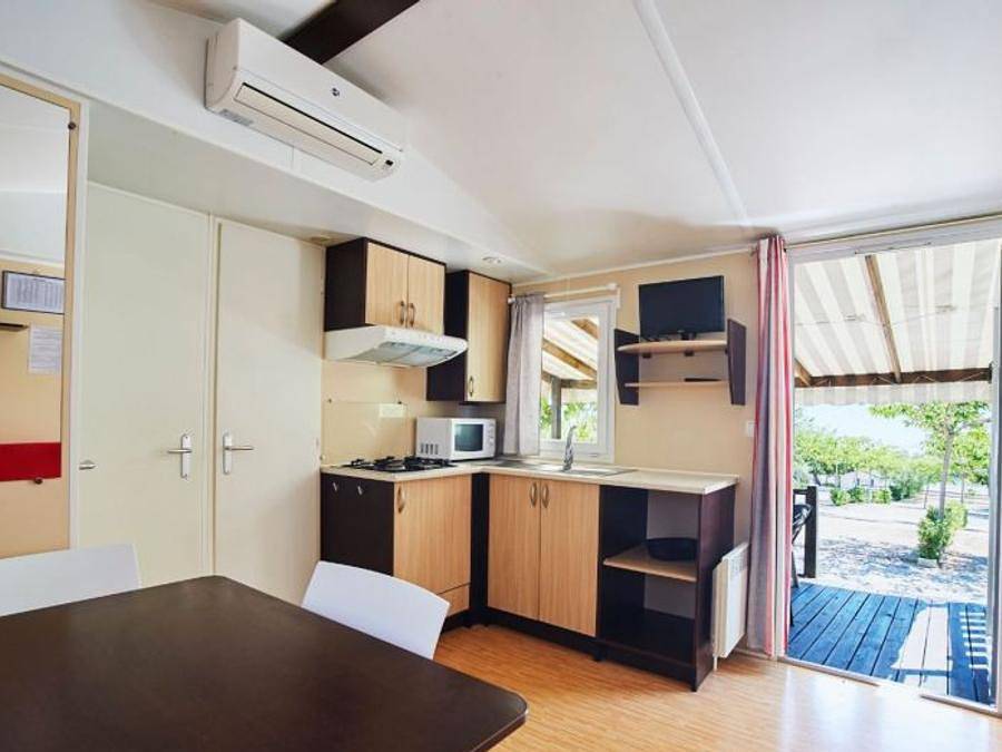 Camping Alannia Costa Dorada - Mobilheim 4 personen - Olea Cottage A1 in Platja de l'Almadrava, Vandellòs i l'Hospitalet de l'Infant