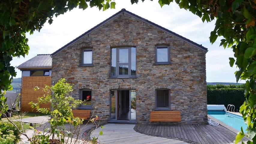 Maison de vacances pour 9 personnes, avec terrasse ainsi que piscine et jardin à Stoumont