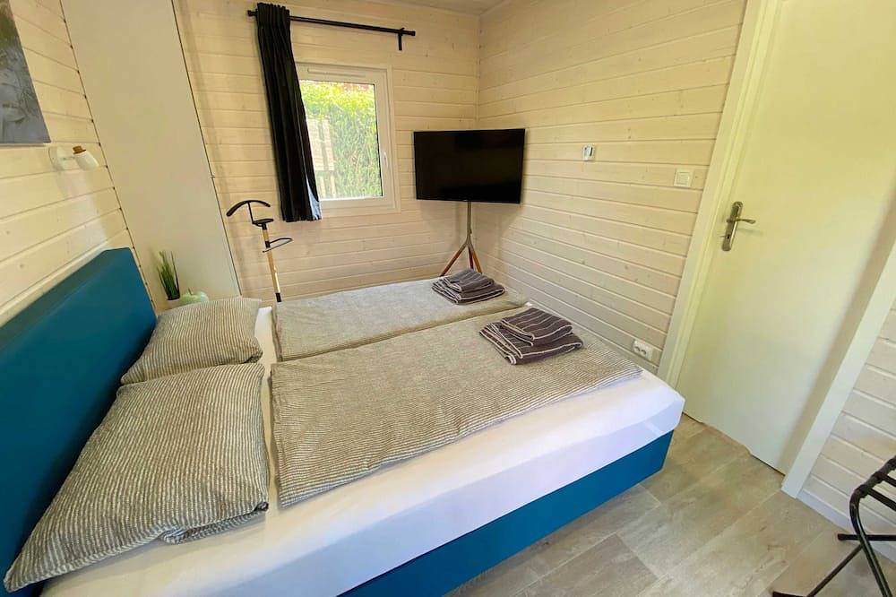 Wassermann vacation home with box-spring beds and large terrace in Wunstorf, Steinhuder Meer