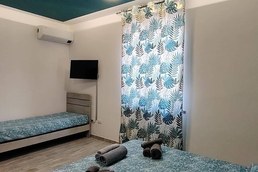 Apartamento entero, Suite Guest House a few steps from the sea in Sassari, Provincia de Sassari